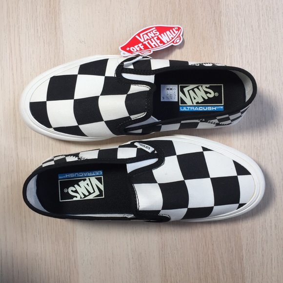 blue and white checkered slip on vans